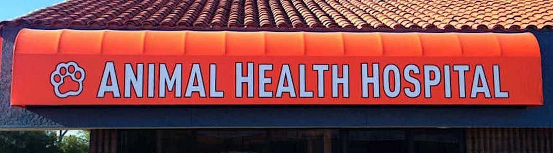 Animal Health Hospital Orange Awning Closeup by Addisigns Tucson
