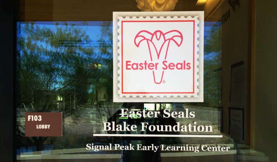 Easter Seals vinyl lettering on a window by Addisigns Tucson and Phoenix