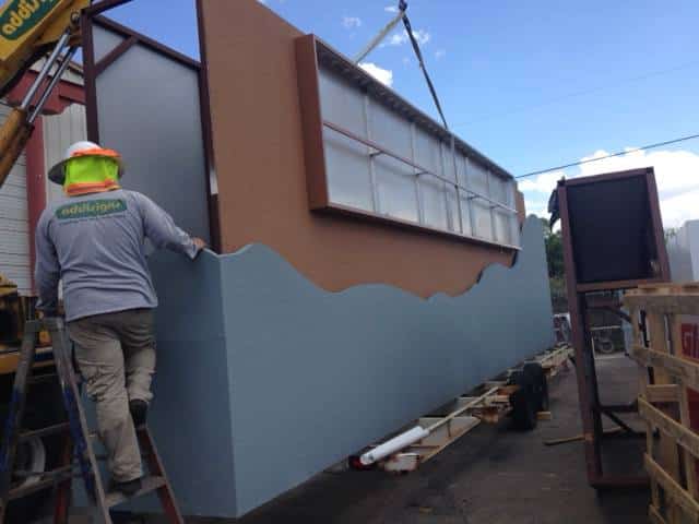 Installer Working on Building Sign - Addisigns sign installation Tucson